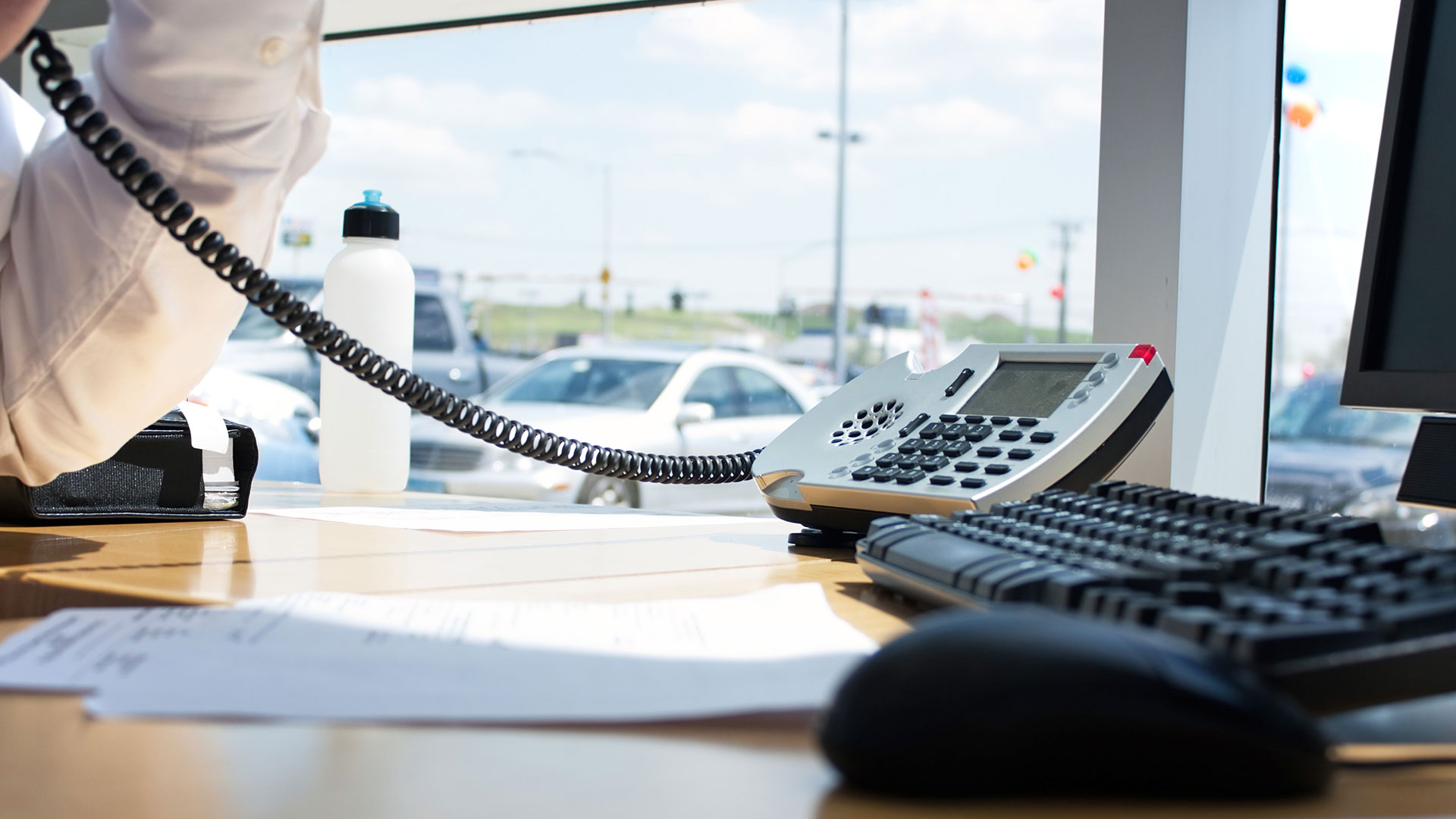 professional on phone at desk in office